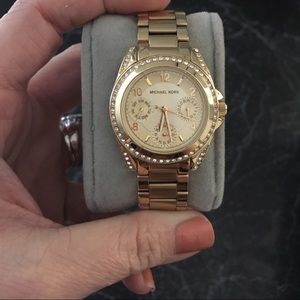 Michael Kors gold tone watch with diamond